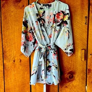 Beautiful light blue floral romper